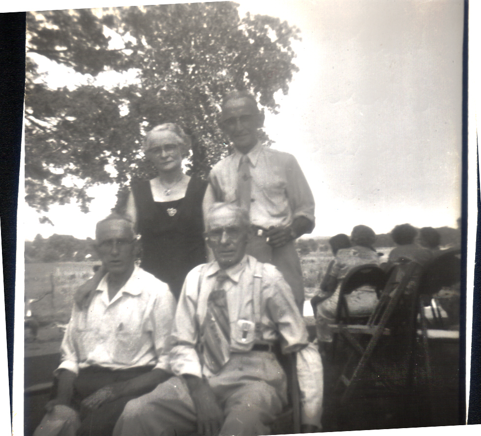 Myrtle and Charlie Haun with William and James Early Fry